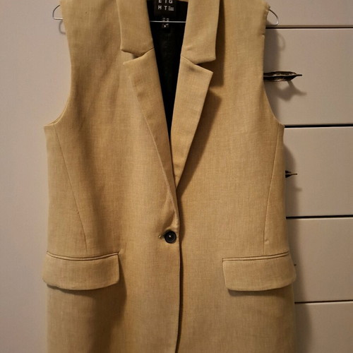 Eight suit like new, worn once