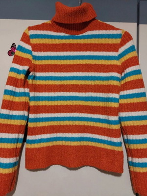 Simple colorful knitted turtleneck sweater