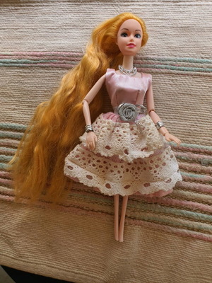 Doll like new, height 28 cm, beautiful