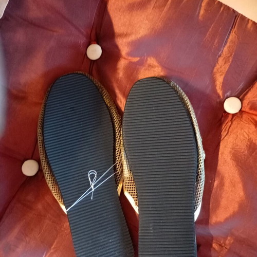 Slippers new, gold color