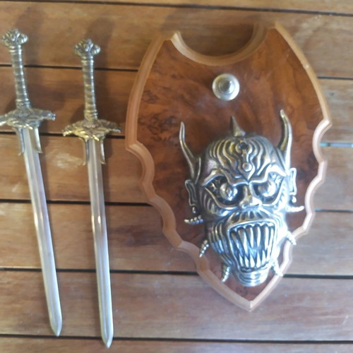 Decorative wall hanging used with swords
