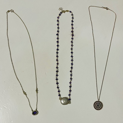 Set of three silver necklaces used