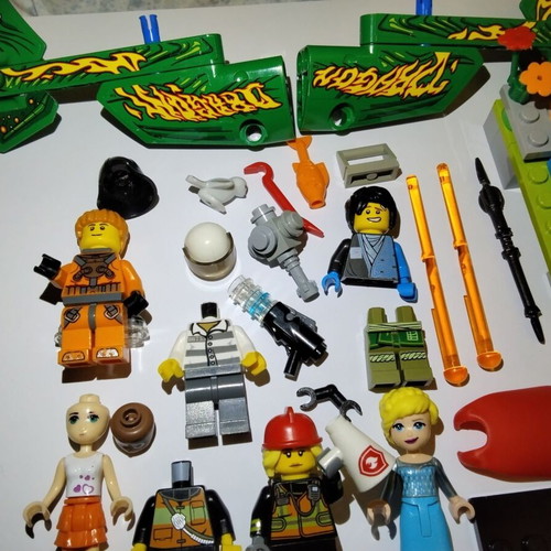 Lego figures, accessories and pieces used, all together