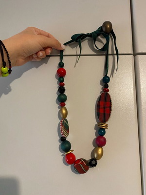 Long beaded necklace like new, red and green shades