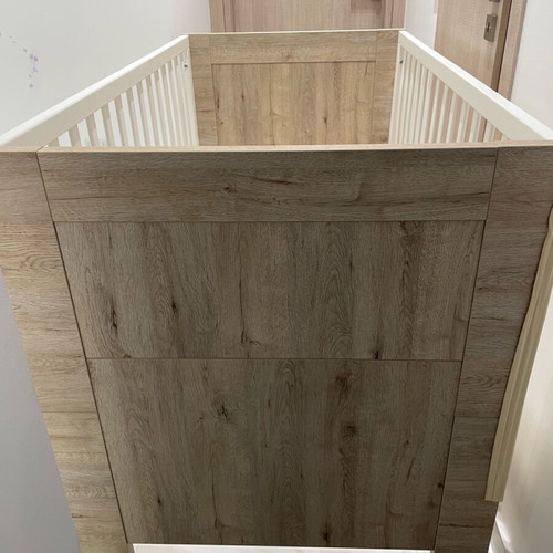 Baby cot used with mattress and linens