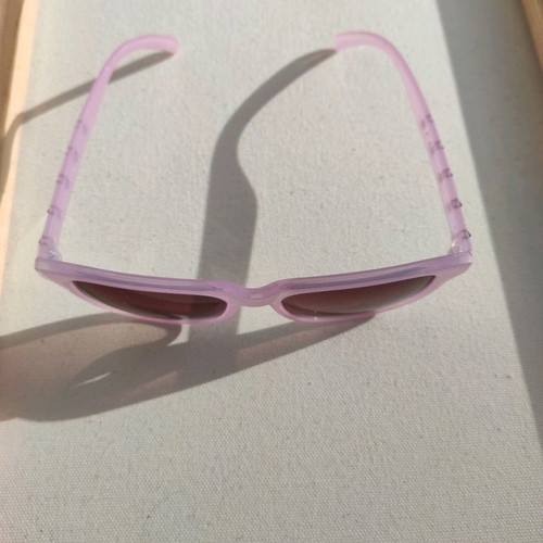 Purple sunglasses used with case