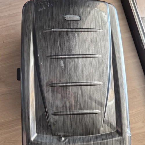 Samsonite hard suitcase used with TSA lock and 4 wheels