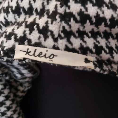 Women's outerwear like new, warm black and white jacket