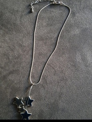 Necklace with chain like new with star design in blue-gray color