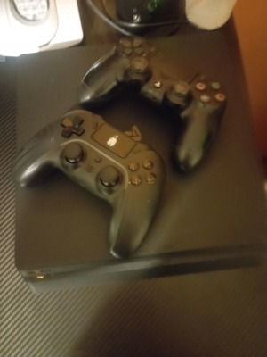 PlayStation 4 Slim 500GB with 16 cartridge games and 5 digital