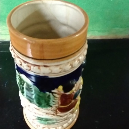 Decorative ceramic beer mug like new with embossed designs