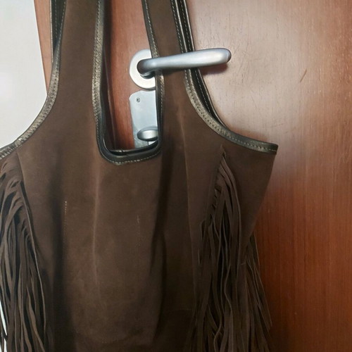 Shoulder bag castor genuine leather like new, brown with fringes