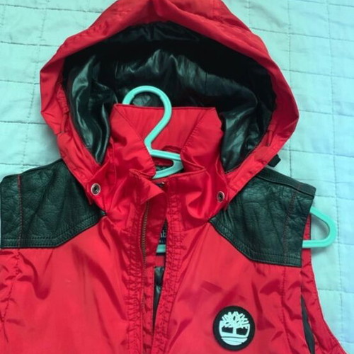 Timberland sleeveless jacket red like new, size 12