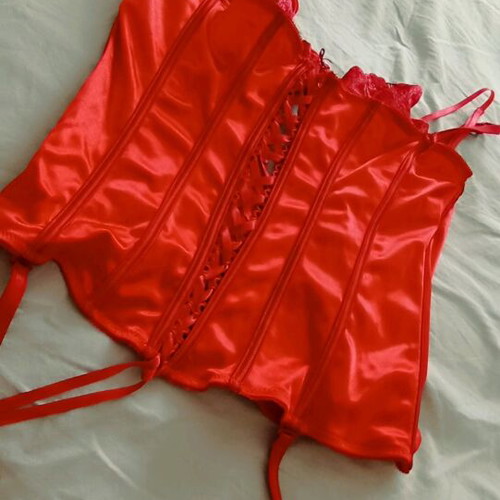 Corset red like new, elastic fit medium to large