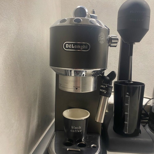 Delonghi Nespresso machine used with coffee bean grinder gift