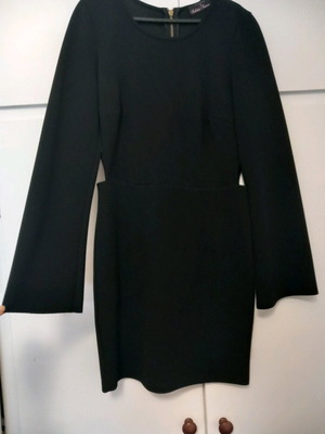 Lynne black dress like new, slim with side cutouts