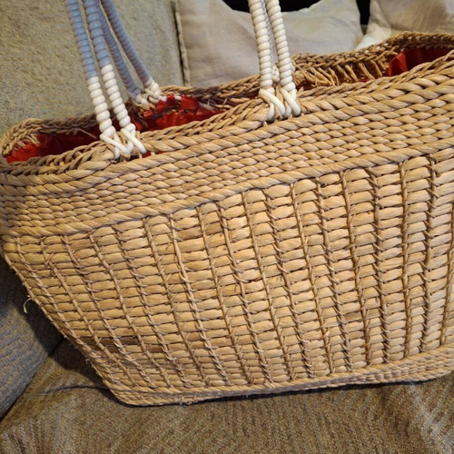 Straw beach bag used, sturdy hand-held