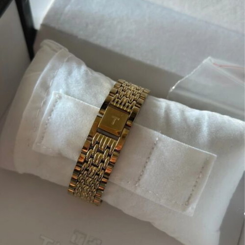 Tissot gold watch