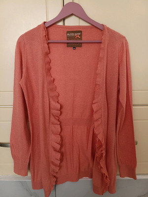 Women's knitted cardigan like new, coral with double ruffle detail