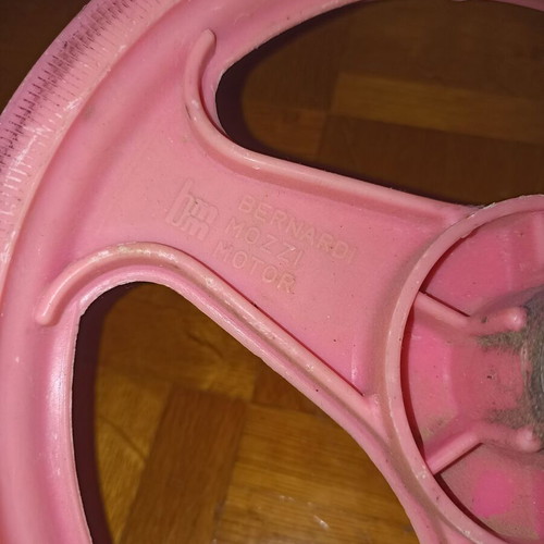 Front 12-inch plastic pink bicycle rim used Italian brand