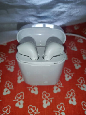 Bluetooth earbuds new, rechargeable with base and charging cable