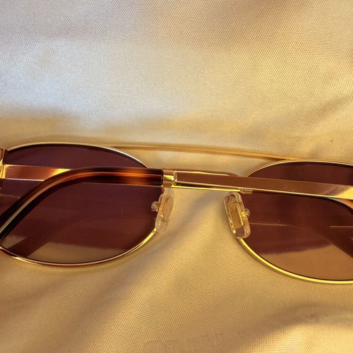 Miu Miu SMU 54ZS ZVN-70D sunglasses like new, gold frame, pink lenses