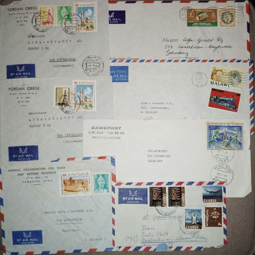 Collection of envelopes and stamps from around the world, new