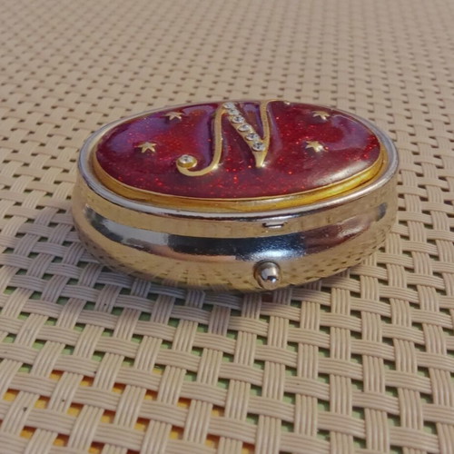 Vintage metal pillbox with red enamel and monogram N, like new