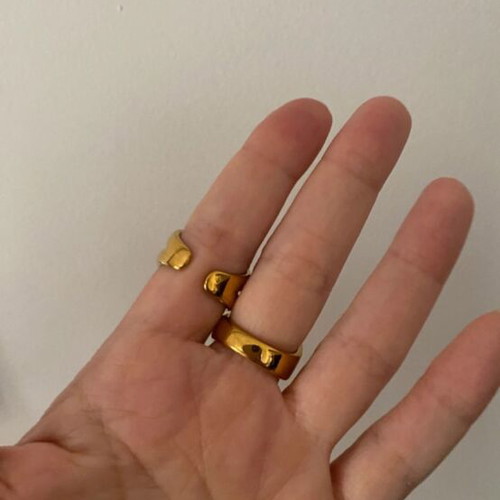 Steel rings couple worn twice, gold color