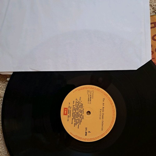Rock music collection used, double vinyl with torn cover
