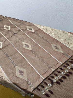 Decorative table runner like new with fringes