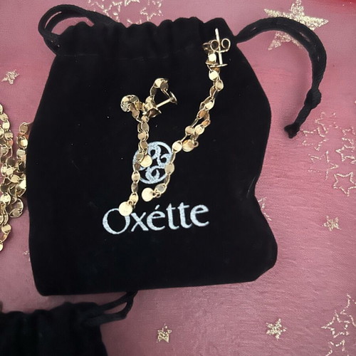 Oxette jewelry set like new, gold necklace and earrings