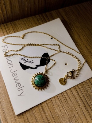 Steel sun necklace with green detail new