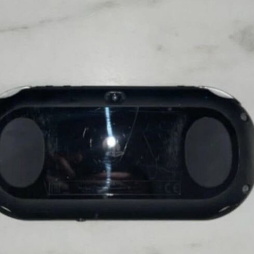 PlayStation Vita like new with 4 games, case and 8GB memory card