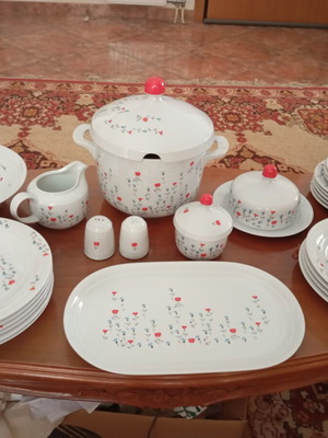 Dinnerware set like new with soup tureen, salad bowls, plates