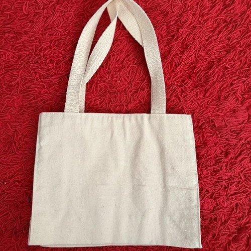 Mini canvas tote bag like new with evil eye print