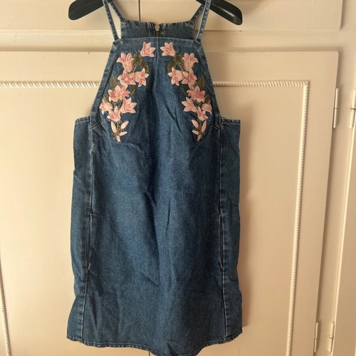 Attrattivo denim dress used with embroidered flowers and pockets