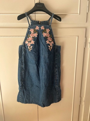 Attrattivo denim dress used with embroidered flowers and pockets