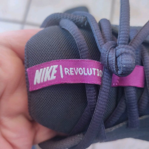 Nike running sneakers used, black with colorful logo, size 39