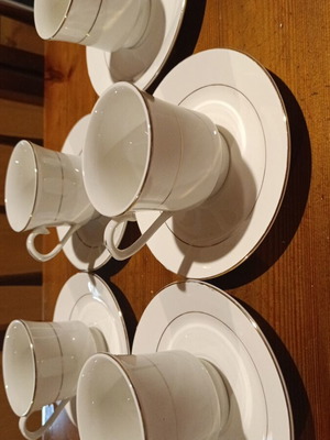 Porcelain tea and coffee set with 5 cups and saucers, white