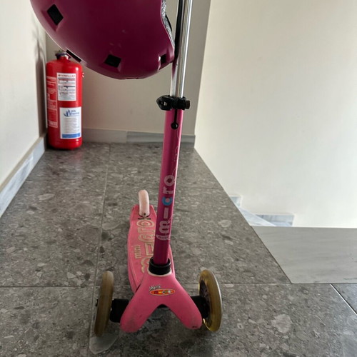 Micro Mini Deluxe Led scooter used with helmet for ages 2-5