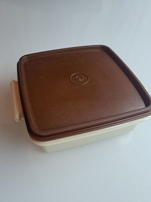 Tupperware container used, practical size 16 cm x 16 cm, brown