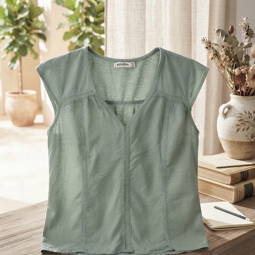 Attrattivo women's green top, size M