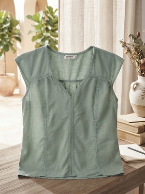 Attrattivo women's green top, size M