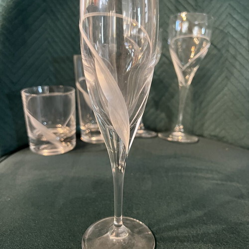 Crystal glass set of 60 with hand-carved design