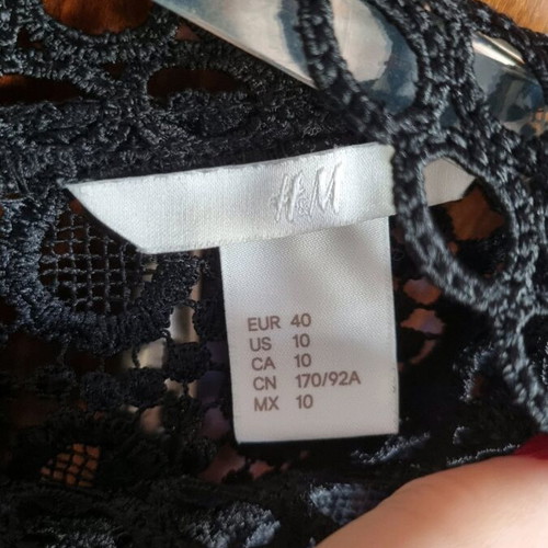 H&M black blouse like new, embroidered style, size L