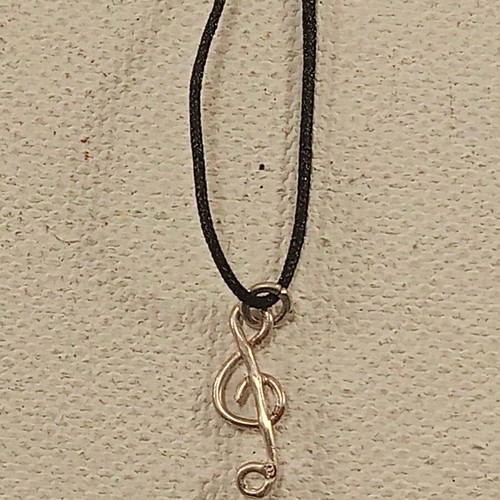 Silver treble clef pendant made to order