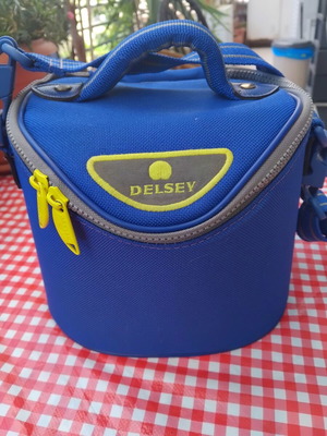 Delsey toiletry bag like new, blue and yellow