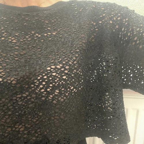 Black perforated blouse like new, medium size, loose fit