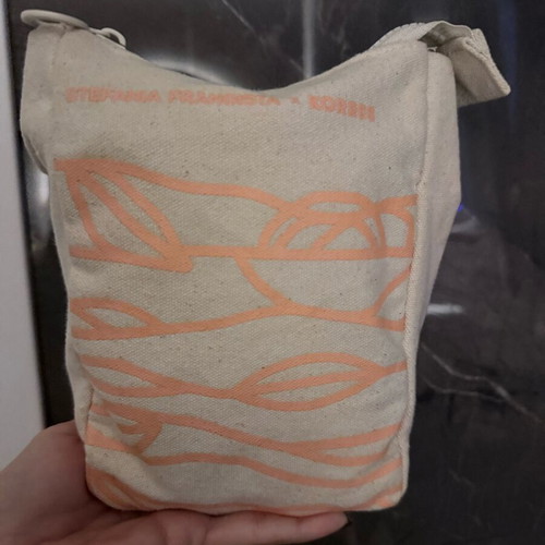 Korres toiletry bag like new, white and beige